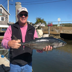 Man with caught fish